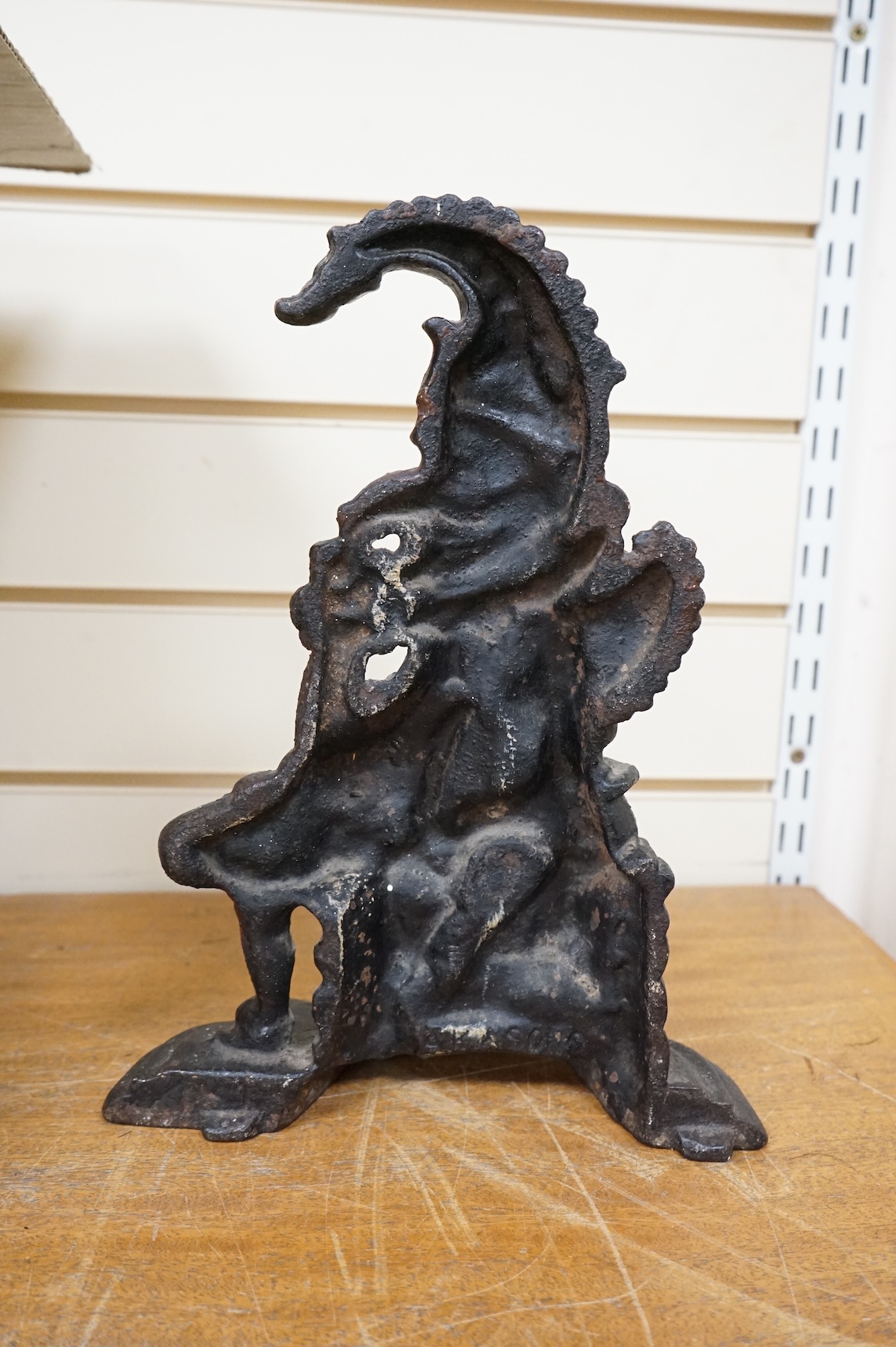 A cast iron Mr Punch door stop, 31cm